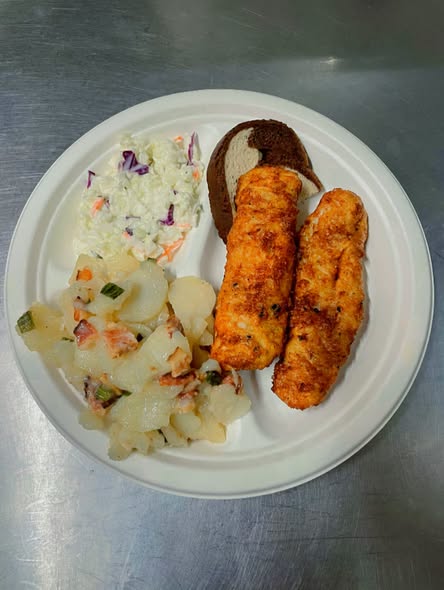 Plate with potato salad and coleslaw
